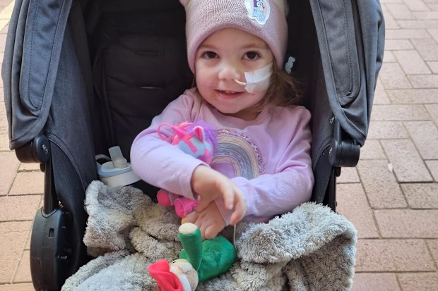 Izzy in hospital after being diagnosed with cancer.