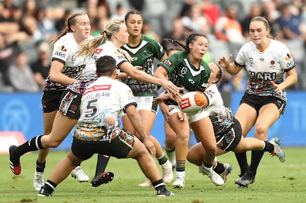 Raecene McGregor of the Maori All Stars offloads during last week's game.