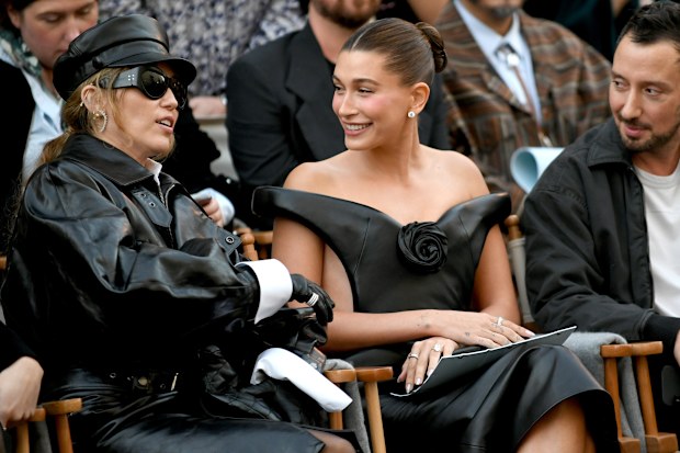 Miley Cyrus, Hailey Bieber, and Anthony Vaccarello at Vogue World: Hollywood 2025 at Paramount Studios on October 26, 2025 in Los Angeles, California. 