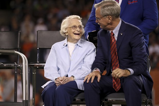 Virginia McCaskey looks up at Bears Chairman George McCaskey before Brian Urlacher was awarded with a ring of excellence during halftime between the Bears and the Seattle Seahawks at Soldier Field on Sept. 17, 2018.