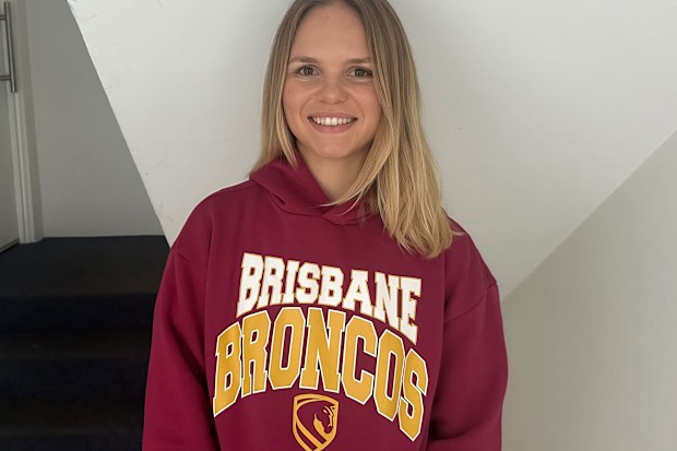Jessi wearing her Brisbane Broncos hoodie from Kmart