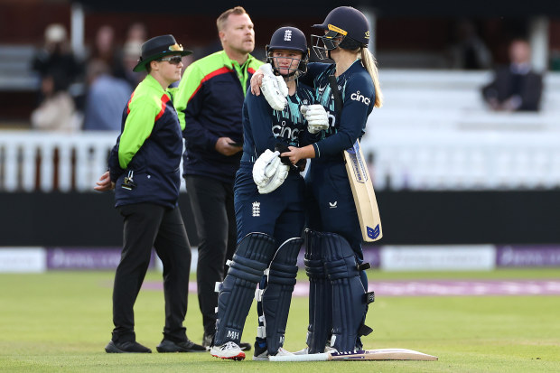 Charlie Dean of England is consoled by Freya Davies of England after Dean was run out Deepti Sharma of India to claim victory during the 3rd Royal London ODI between England Women and India Women at Lord's Cricket Ground on September 24, 2022 in London, England. (Photo by Ryan Pierse/Getty Images)