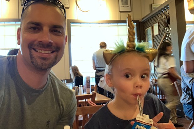 Police Officer Brian Zach and his adopted daughter Kaila