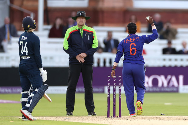 Charlie Dean of England reacts after being run out by Deepti Sharma of India to claim victory during the 3rd Royal London ODI between England Women and India Women at Lord's Cricket Ground on September 24, 2022 in London, England. (Photo by Ryan Pierse/Getty Images)