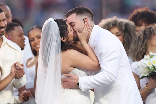 A couple marries during the Bad Bunny performance at the Super Bowl LX Halftime Show at Levi's Stadium on February 8, 2026 in Santa Clara, California. 