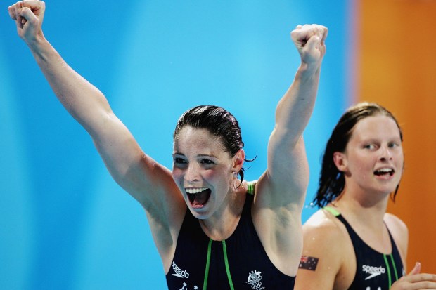 Giaan Rooney, pictured celebrating relay gold at Athens 2004, says she's glad she retired in 2006 because she avoided facing an exceptional 14-year-old called Emily Seebohm.