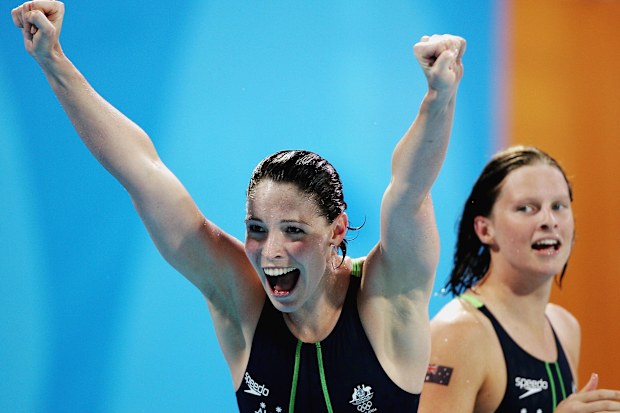 Giaan Rooney, pictured celebrating relay gold at Athens 2004, says she's glad she retired in 2006 because she avoided facing an exceptional 14-year-old called Emily Seebohm.