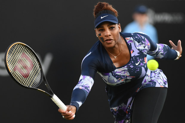 Serena Williams of United States of America plays a forehand during their Women's Doubles Round One match against Marie Bouzkova of Czech Republic and Sara Sorribes Tormo of Spain on Day 4 of the Rothesay International at Devonshire Park on June 21, 2022 in Eastbourne, England. (Photo by Mike Hewitt/Getty Images)