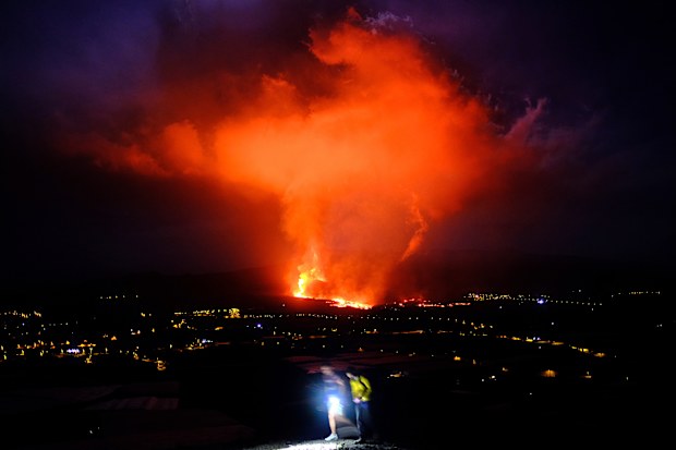 Lava spews from a volcano on the Canary island of La Palma, Spain