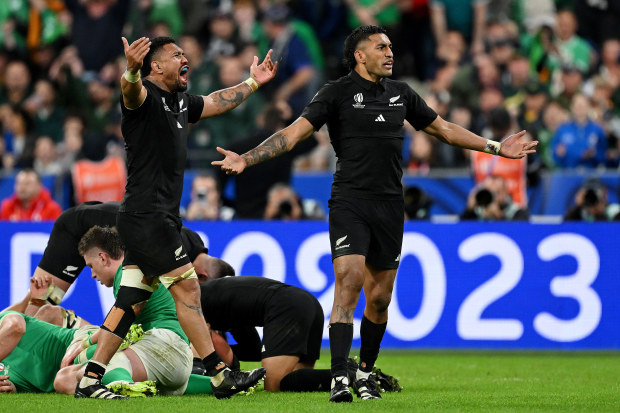 Ardie Savea and Rieko Ioane of New Zealand celebrate victory at full-time following the Rugby World Cup quarter-final match against Ireland at Stade de France.