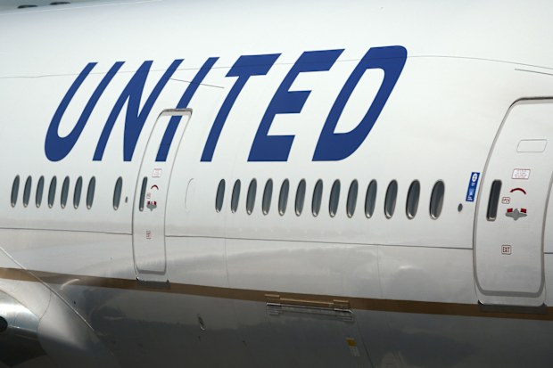 A United Airlines Boeing 777 passenger aircraft at Denver International Airport