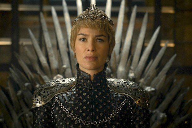 Lena Headey sits on the Iron Throne in Game of Thrones 