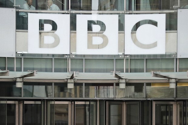 This photo shows a BBC sign outside the entrance to the headquarters of the publicly funded media organisation in London, July 19, 2017. 