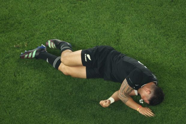 Quinn Tupaea of the All Blacks is injured at Marvel Stadium.
