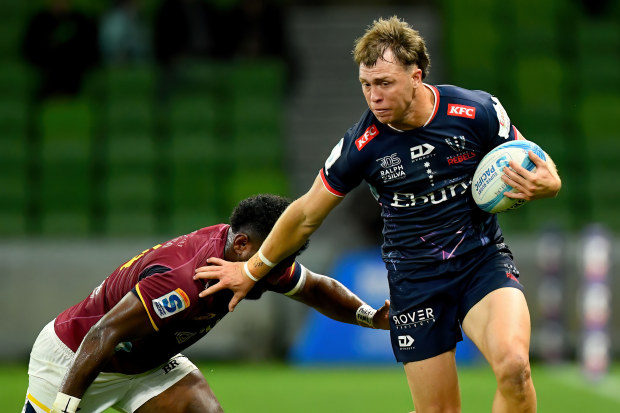 Darby Lancaster of the Rebels makes a break to score a try during the round eight Super Rugby Pacific.