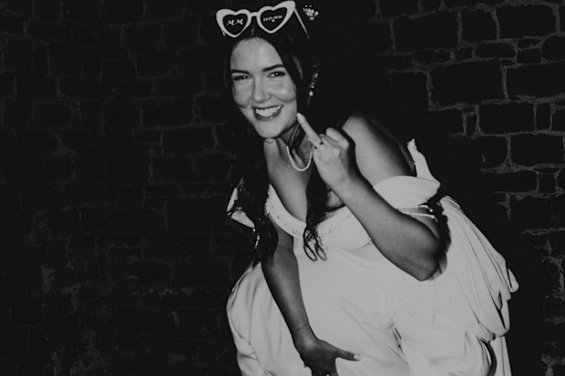 Reporter Maddison Skipper with her husband at their May 2026 wedding.