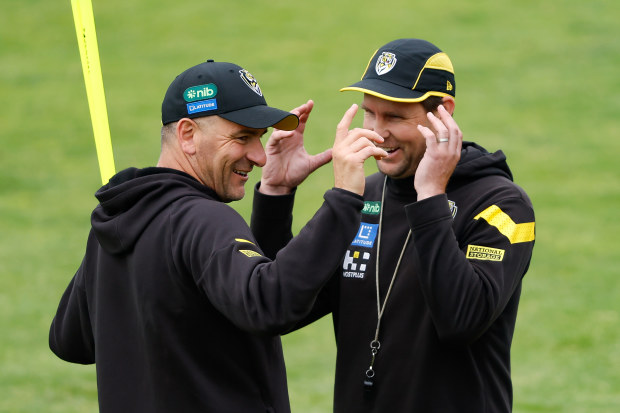 Adem Yze, Senior Coach of the Tigers and David Teague, Assistant Coach of the Tigers are seen during training session.