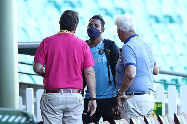 Mohammed Siraj of India speaks with Cricket Australia staff after day three.