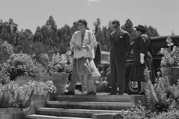 Princess Elizabeth and Prince Philip arrive at Sagana Lodge in Nyeri County, during a Commonwealth visit to Kenya, 5th February 1952. With them are Sir Philip Mitchell, Governor of Kenya (behind the princess) and his wife Margery Tyrwhitt-Drake (right). The following day, during a walk in the grounds on the royal couple's return to the lodge from the Treetops Hotel, Prince Philip would break the news to Elizabeth that her father, King George VI, had died during the night and that she had acceded