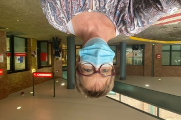 Simone wearing a mask outside the hospital.