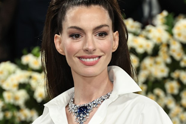 NEW YORK, NEW YORK - MAY 05: Anne Hathaway attends the 2025 Met Gala Celebrating "Superfine: Tailoring Black Style" at Metropolitan Museum of Art on May 05, 2025 in New York City.  (Photo by Jamie McCarthy/Getty Images)
