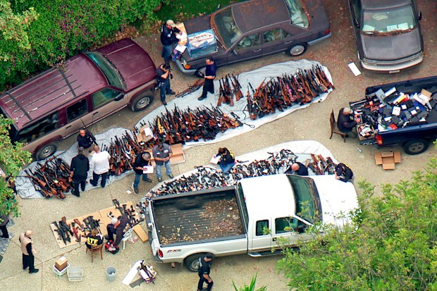 Authorities seized more than a thousand guns from an LA home after getting an anonymous tip regarding illegal firearms sales in a posh area near the Playboy Mansion.