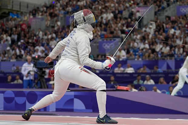 FILE - Egypt's Nada Hafez competes with United States' Elizabeth Tartakovsky in the women's individual Sabre round of 32 competition during the 2024 Summer Olympics at the Grand Palais, Monday, July 29, 2024, in Paris, France. (AP Photo/Andrew Medichini, File)