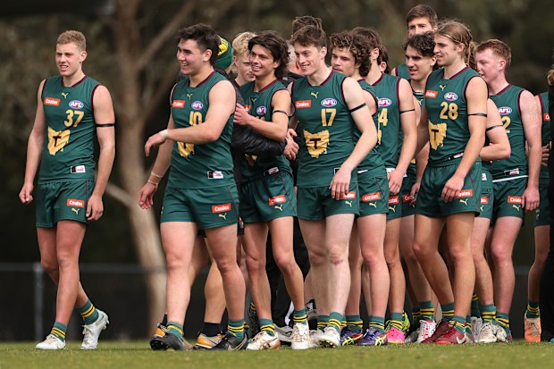 Tassie Devils players celebrate the win during the Coates Talent League 