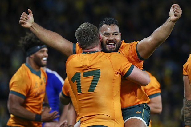 Australia's Taniela Tupou and Angus Bell celebrate after defeating France.