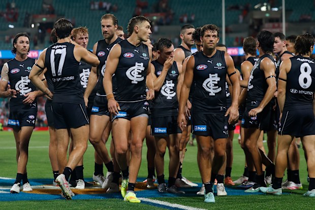 Patrick Cripps leads Carlton off the field.