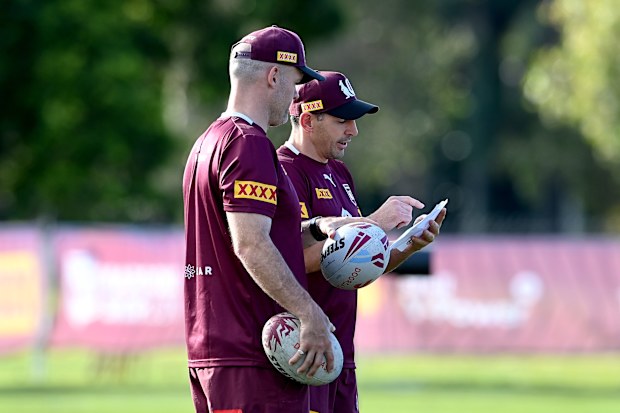 Coach Billy Slater and his assistant Nate Myles are seen talking tactics during a Queensland Maroons training session at Sanctuary Cove.