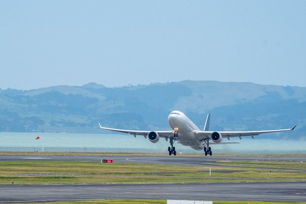 A plane taking off at Auckland Airpory