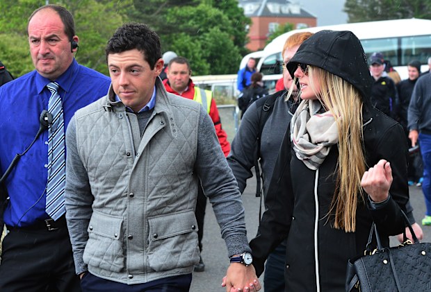 Rory McIlroy of Northern Ireland arrives at the course with new girlfriend Erica Stoll during the fourth round of the Dubai Duty Free Irish Open, 2015