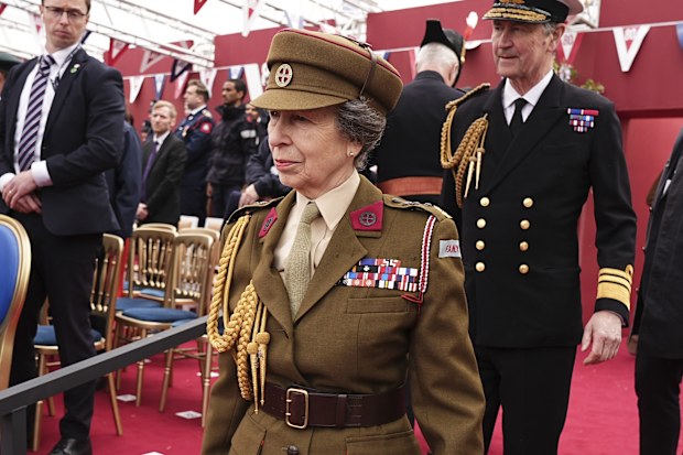 Britain's Princess Anne and Vice Admiral Sir Tim Laurence arrive for the military procession the military procession marking the 80th anniversary of VE Day, in London, Monday, May 5, 2025. (Aaron Chown/Pool Photo via AP)