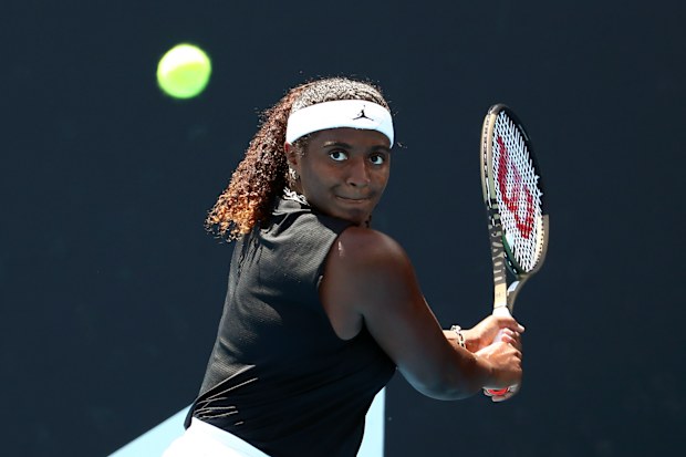 Hailey Baptiste of the United States plays a backhand return to Caroline Garcia of France.