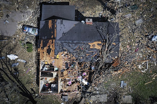 A house is destroyed from a tornado in  Covington, Tenn., Saturday, April 1, 2023. 