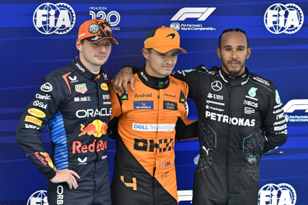 Pole position winner Lando Norris (middle) with Max Verstappen (left) and Lewis Hamilton (right).