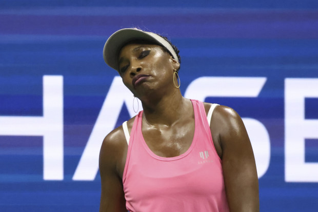 US tennis legend Venus Williams cut a glum figure after she was hosed by Germany's Greet Minnen in the first round of this year's final grand slam.