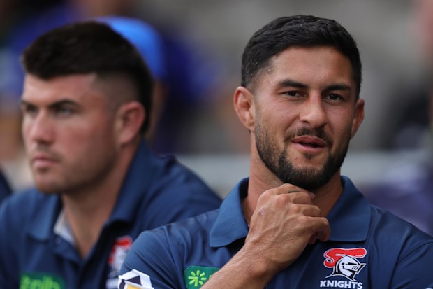 Dylan Brown of the Knights sits alongside Bradman Best on the bench.