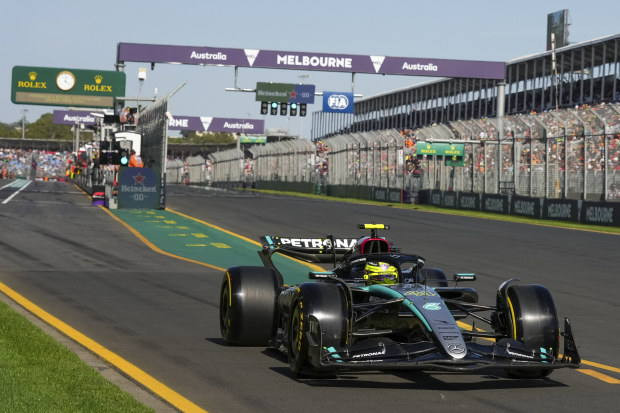Mercedes driver Lewis Hamilton of Britain steers his car out of pit lane during practice at the Australian Grand Prix.