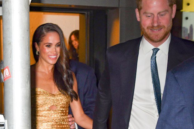  Meghan Markle, Duchess of Sussex, and Prince Harry, Duke of Sussex leave The Ziegfeld Theatre on May 16, 2023 in New York City.