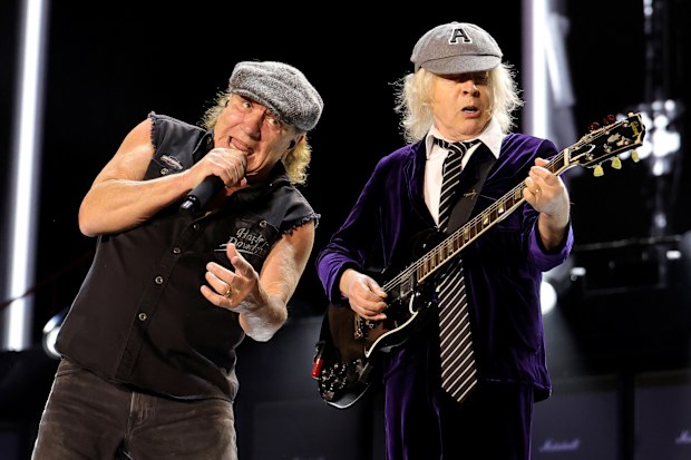 Brian Johnson (L) and Angus Young of AC/DC 