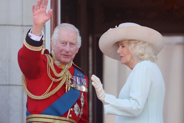 King Charles III and Queen Camilla during Trooping the Colour at Buckingham Palace on June 15, 2024 in London, England. 