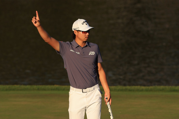 Min Woo Lee of Australia reacts to his attempt for birdie on the 17th green.