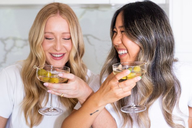 SIP'ER's founders Bree Nicholls and Jenny Cheng drinking dirty martinis