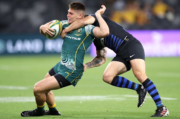 James O'Connor of the Wallabies is tackled.
