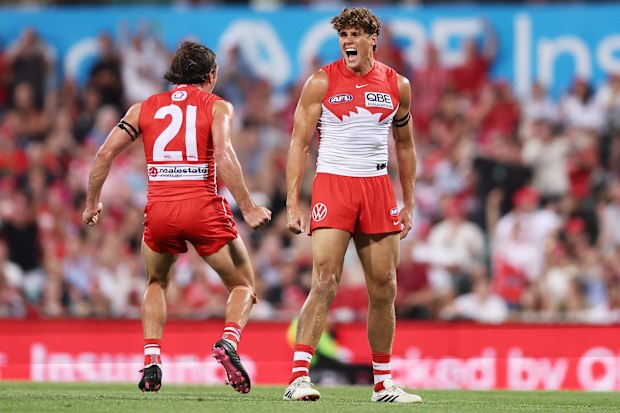 SYDNEY, AUSTRALIA - MARCH 05:  Charlie Curnow of the Swans celebrates with Errol Gulden of the Swans after kicking his first goal during the opening round AFL match between Sydney Swans and Carlton Blues at SCG, on March 05, 2026, in Sydney, Australia. (Photo by Matt King/AFL Photos/via Getty Images)