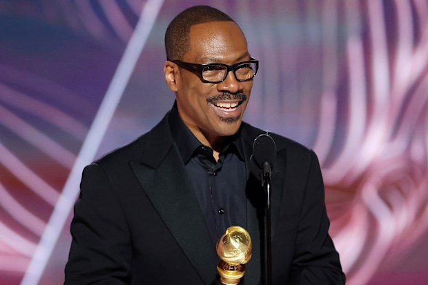 Honoree Eddie Murphy accepts the Cecil B. DeMille Award onstage at the 80th Annual Golden Globe Awards