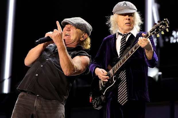 Brian Johnson (L) and Angus Young of AC/DC 
