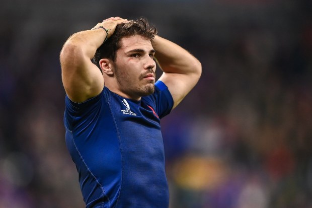 Antoine Dupont of France reacts after his side's defeat.
